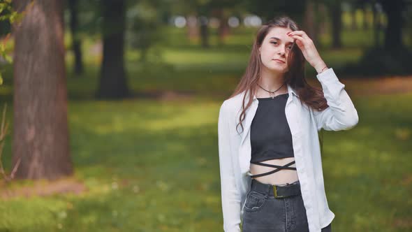 Portrait of a Smiling Young Georgian Girl in a Park