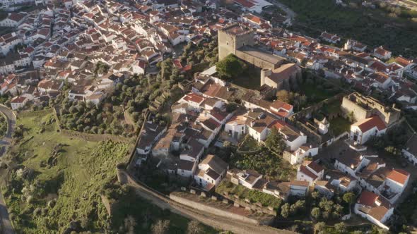 Aerial drone view of Castelo de Vide in Alentejo, Portugal and Serra de Sao Mamede mountains on the