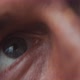 Detail of a man's blue eye and a light flare - VideoHive Item for Sale