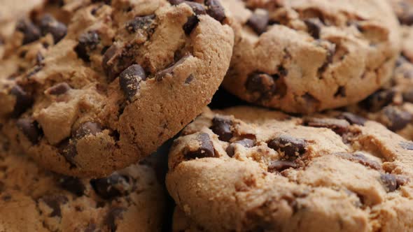 Lot of chip cake cookies with chocolate close-up tilting 4K 3840X2160 30fps UHD footage - Slow tilti