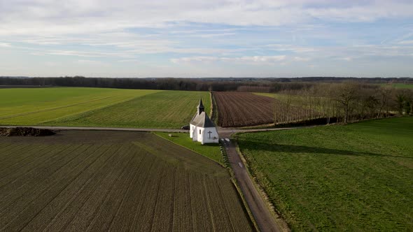 Aerial View of Small Rural Chapel Located in Bousval Belgiium