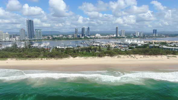 Beach at Gold Coast Spit looking over towards Broadwater, Clear summers day, Marina yachts.