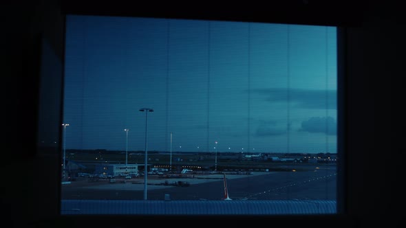 Timelapse view of airport runway from night to day time in Amsterdam Airport Schiphol, Netherlands