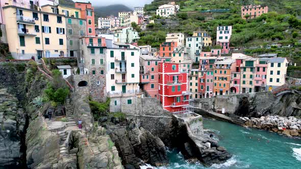 Riomaggiore Italy colorful buildings in Portside town along Italian Cinque Terre Mediterranean Coast