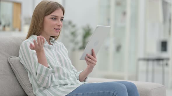 Professional Young Woman Doing Video Call on Tablet 