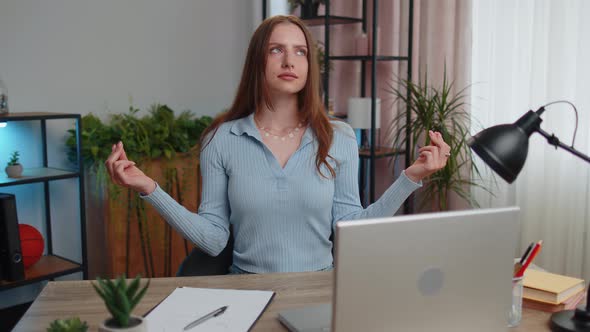 Tired Woman Freelancer Suffering From Headache Migaine  Closing Eyes Meditating at Home Office