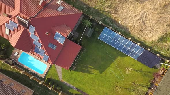 Aerial view of a private house with green grass covered yard