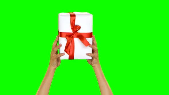 Hands Appearing, Holding Present Box, Showing Thumbs Up