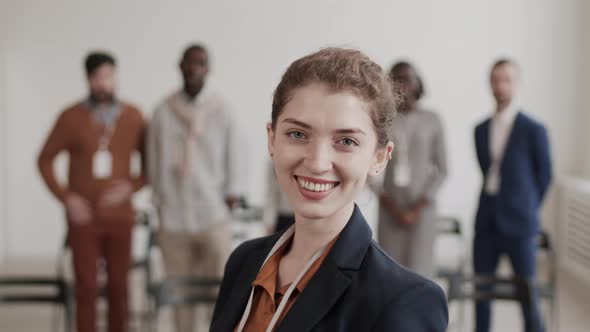 Caucasian Businesswoman Turning Around Posing