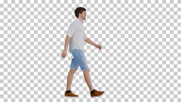 Casual young man walking and looking forward, Alpha Channel