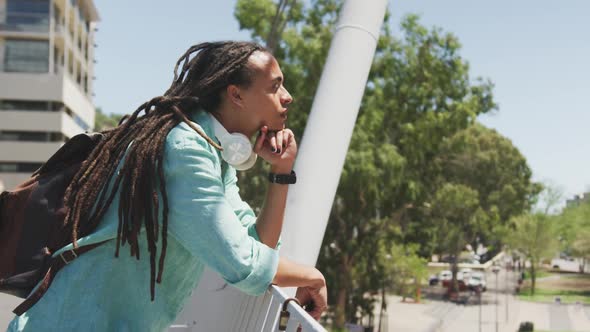 Mixed race man talking on the phone