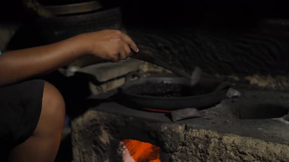 Traditional Process Boil and Roasting Coffee on Coals