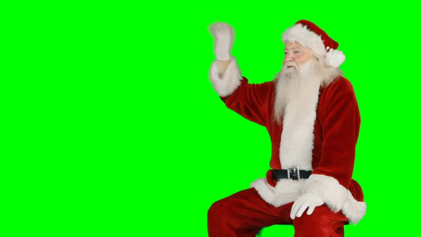 Santa claus waving hands