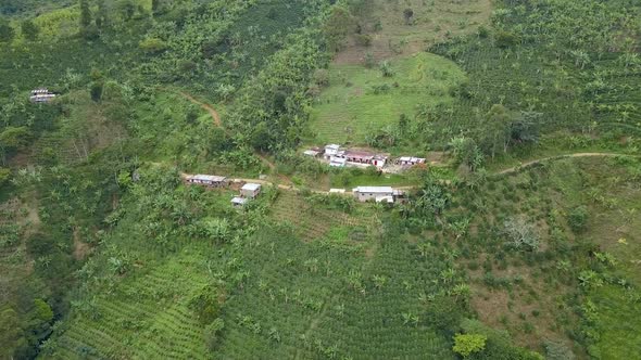 Aerial shot of farmers living on lush mountainside, Valle del Cauca, Colombia