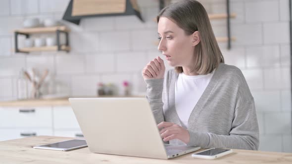 Sick Young Woman Having Coughing in Office