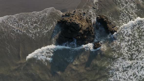 Aerial view of waves against rocks in Costa Rica