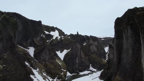 Aerial view of Fjardarargljufur canyon with river in wintertime, Iceland.