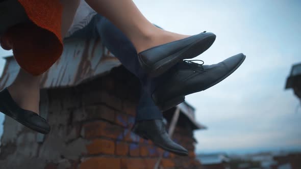 Married Couple About To Celebrate and Legs Chatter on Roof