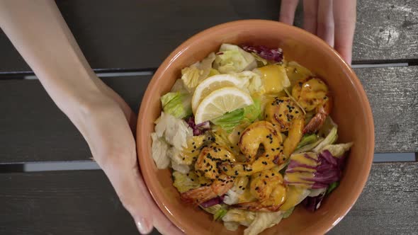 Salad with Shrimps Sprinkled with Black Sesame Seeds