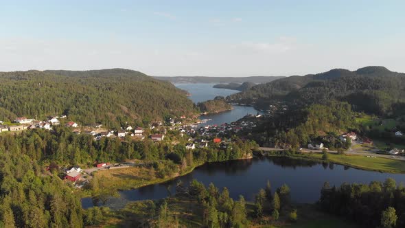 Beautiful fishing villages on Norwegian fjords coastline, summer aerial view