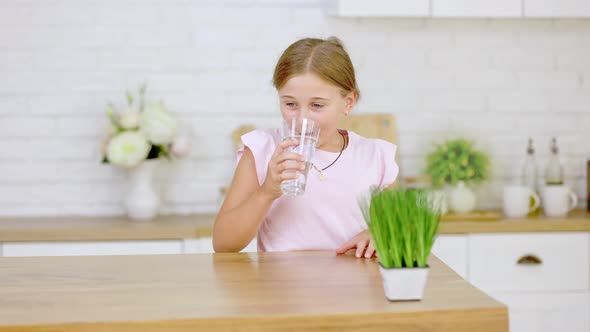 Girl Drinks Water and Glasses