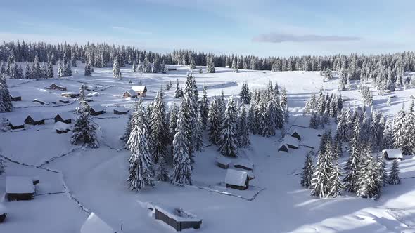 Snow Covered Remote Village in the Mountains alt