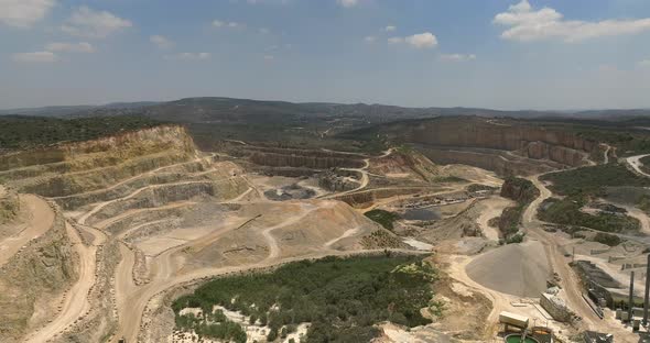 Layers and levels of an open pit mine, Aerial view.