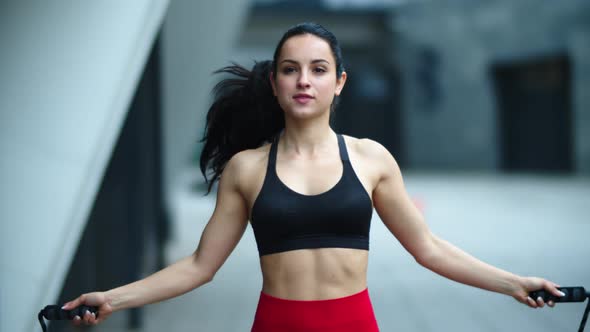 Athlete Woman Jumping on Skipping Rope, Sporty Girl Finishing Cardio Exercise