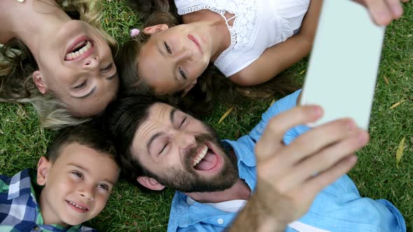 Happy Family Taking a Selfie