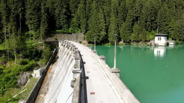 Alpin Lake and Dam in Summertime View From Drone Auronzo Italian Dolomites