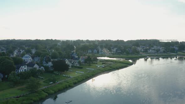 Aerial Drone Shot Ascending to Reveal a Suburban Coastline Neighborhood (Norwalk, Connecticut)