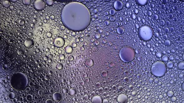 Colors changing as bubbles move in liquid