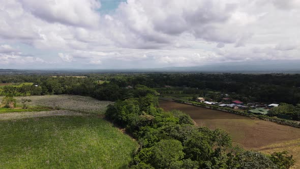 4k aerial footage of Costa Rican farmland in the province of Alajuela. Green season in central Ameri