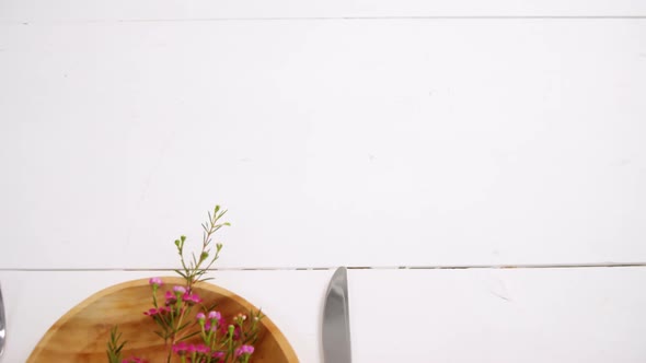 Various cutlery on wooden table 4k