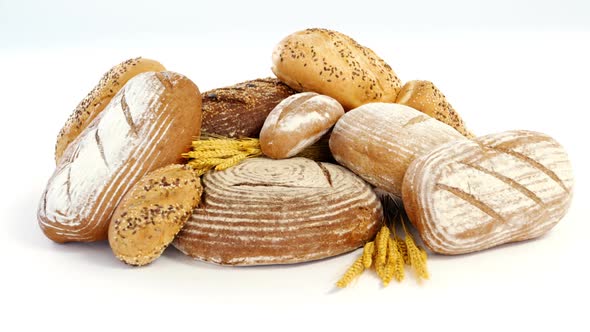 Various types of breads with wheat grains