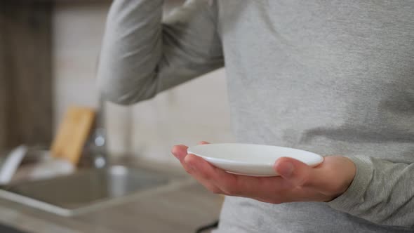 Guy Is Drinking Hot Strong Coffee From a White Cup