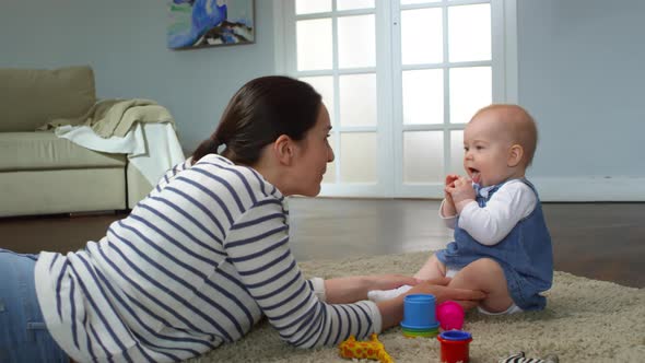 Mom Talking Sweetly to Baby Girl