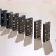 Falling dominoes. Chain reaction, built figure of dominoes falling in slow motion. - VideoHive Item for Sale