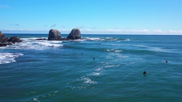 surfing in punta de lobos chile sunny day incredible landscape recorded with drone