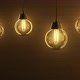 Golden Flicker Bulb Lights Bouncing on a Wire Flashing Lights Lanterns - VideoHive Item for Sale