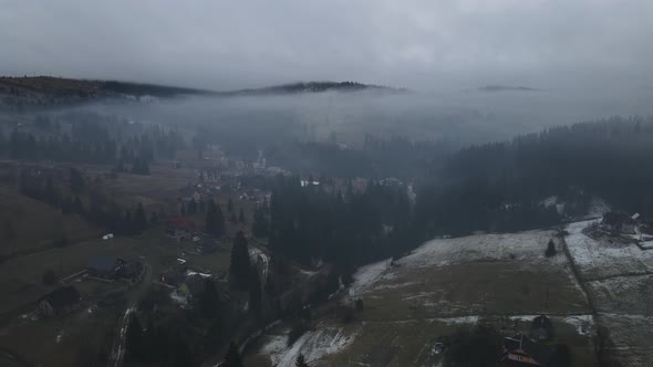 Winter Landscape Of The Carpathian Mountains In The Fog From A Bird's Eye View