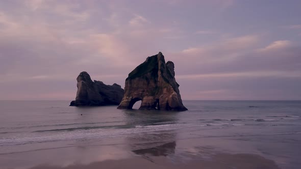 Rock with archway in the sea