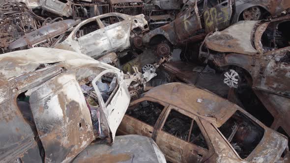 War in Ukraine a Dump of Burned Cars in Irpin Bucha District