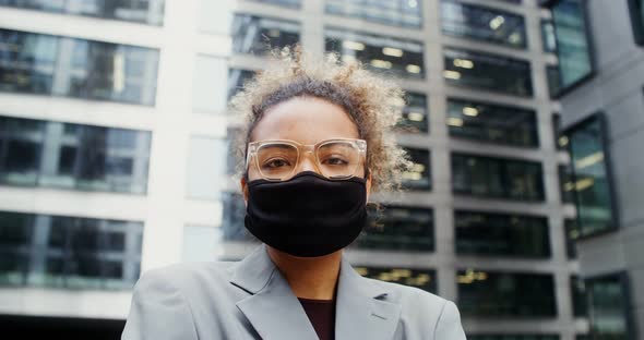 AfricanAmerican Businesswoman Looks at the Camera