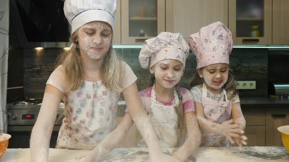 Children playing with flour