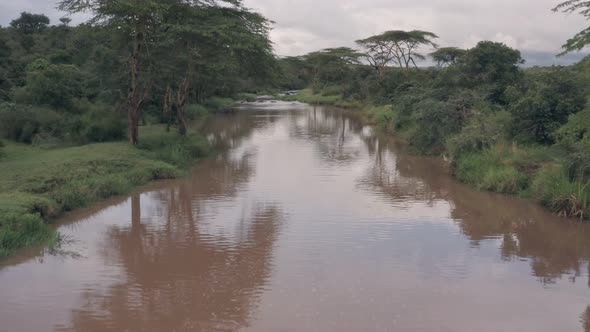 Aerial drone view of Kenyan river landscape scenery in Laikipia, Kenya