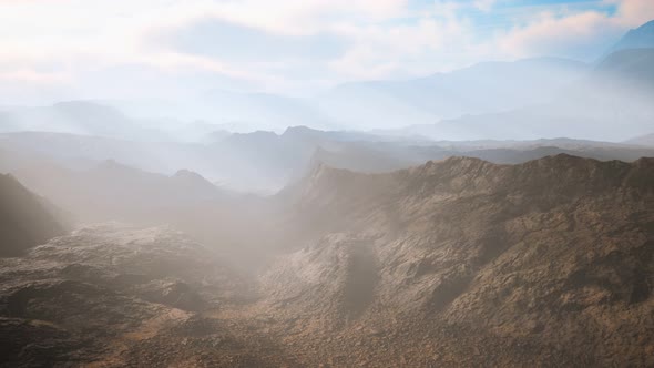 Aerial Vulcanic Desert Landscape with Rays of Light