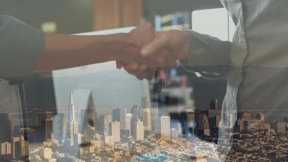 Handshake with city in background alt