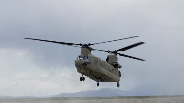 Chinok helicopter landing in field durning training