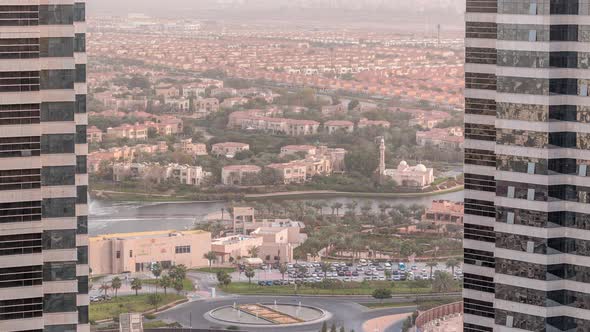 Aerial View of Apartment Houses and Villas in Dubai City Timelapse United Arab Emirates